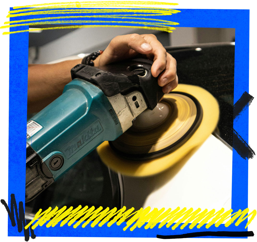 Auto detailer with a polisher.